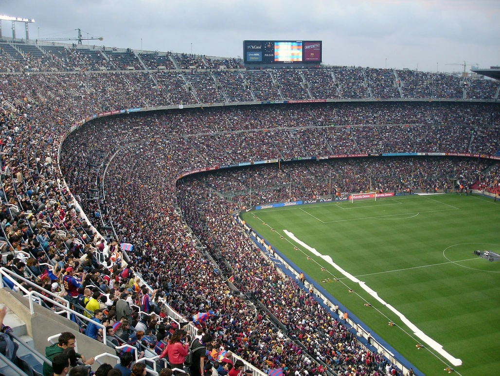 large football stadium view with thousands of spectators